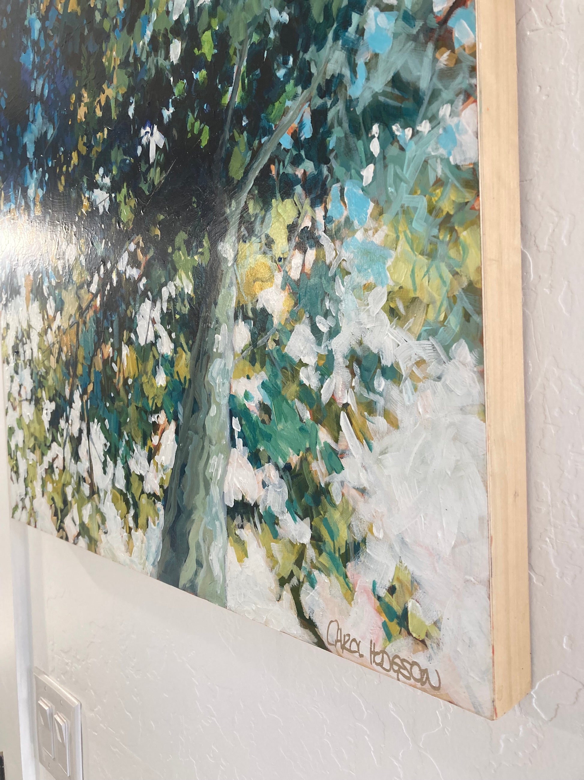 Image of painting showing the wooden sides.