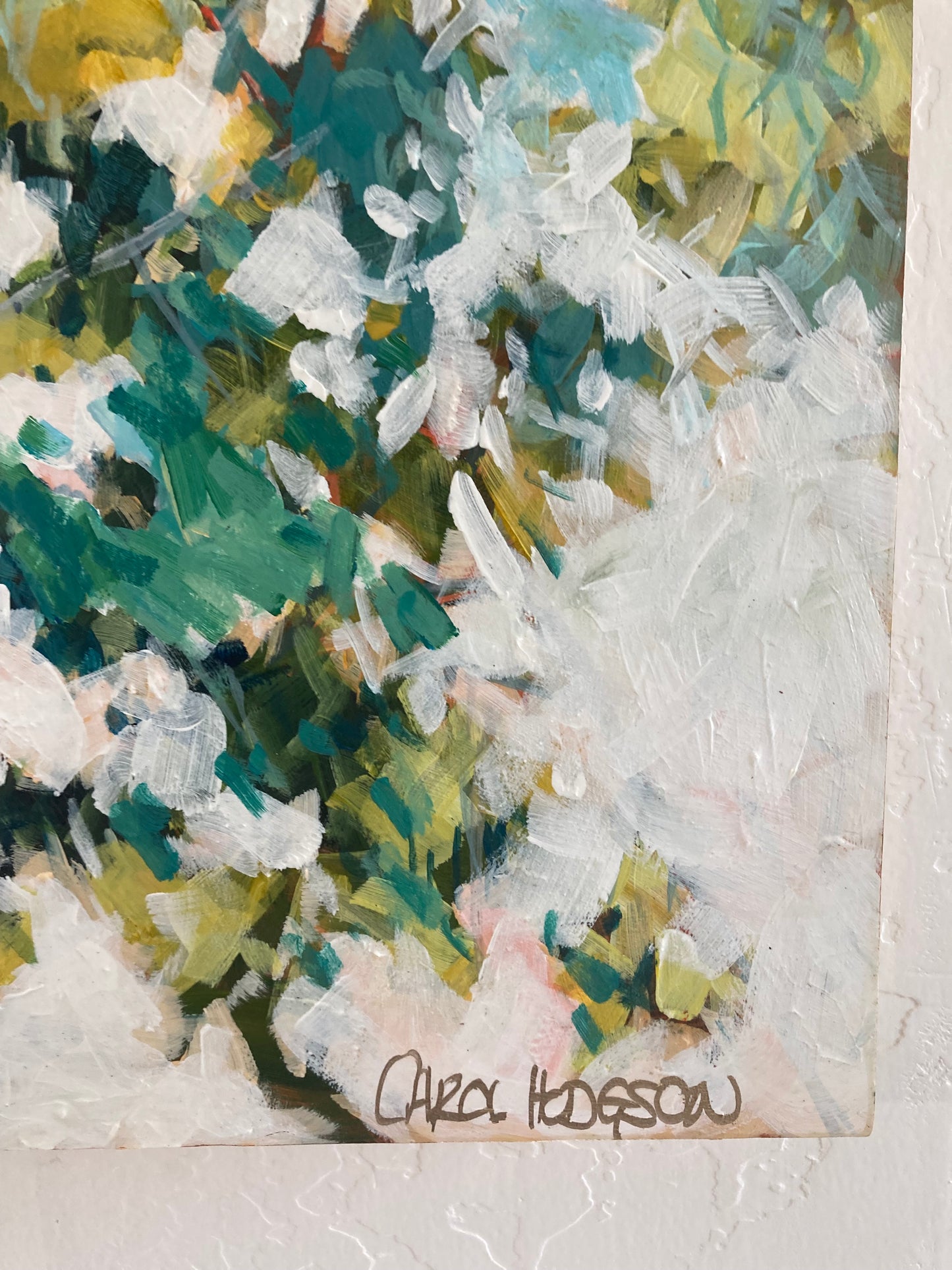 Image close up including artists signature.