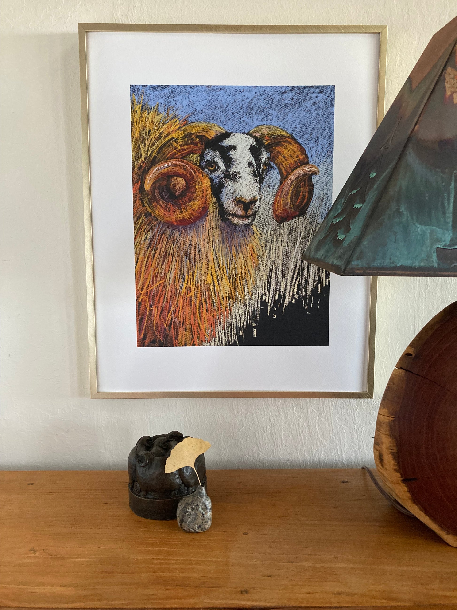 Sheep print in gold frame example.
